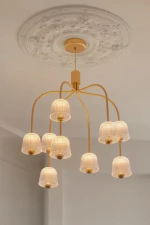 Lampadario a LED Nuura Asteea 9, Ø 66 cm, color ottone/trasparente Acquista Ora
