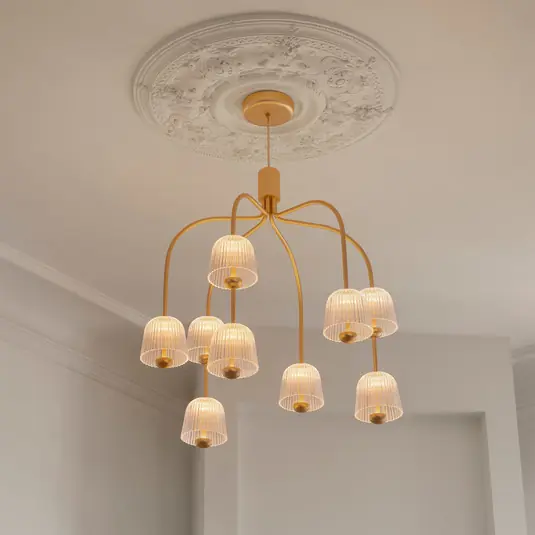 Lampadario a LED Nuura Asteea 9, Ø 66 cm, color ottone/trasparente Acquista Ora
