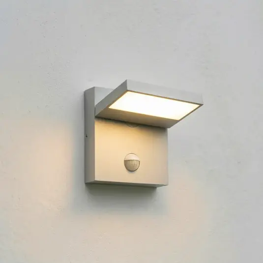Applique da esterni LED Lucande Silvan, grigio pietra, con sensore, IP54 Spedito Oggi
