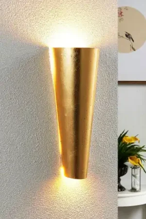 Applique Conan di forma compiuta in oro Compra Adesso