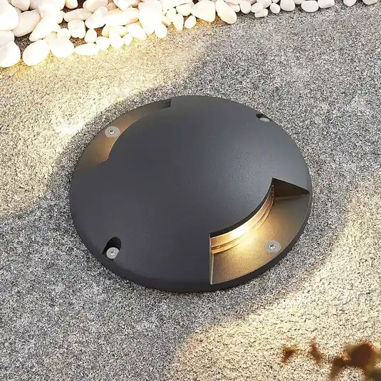 Lindby Faretto da pavimento Cormac, a 2 luci, Ø 21 cm, IP67 Subito Disponibile