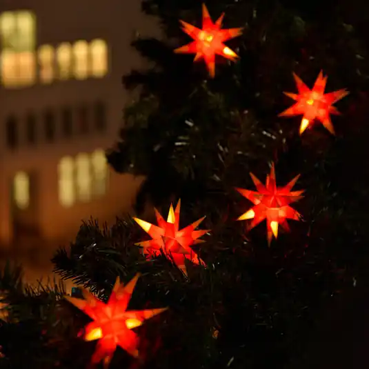 Acquista Ora Ghirlanda luminosa LED bicolore con 9 stelle gialle e rosse
